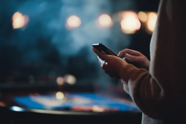 67777 Live Games — Take part in high-energy casino action A glowing roulette wheel with cascading chips, symbolizing the engaging live and instant-win games available on 67777.